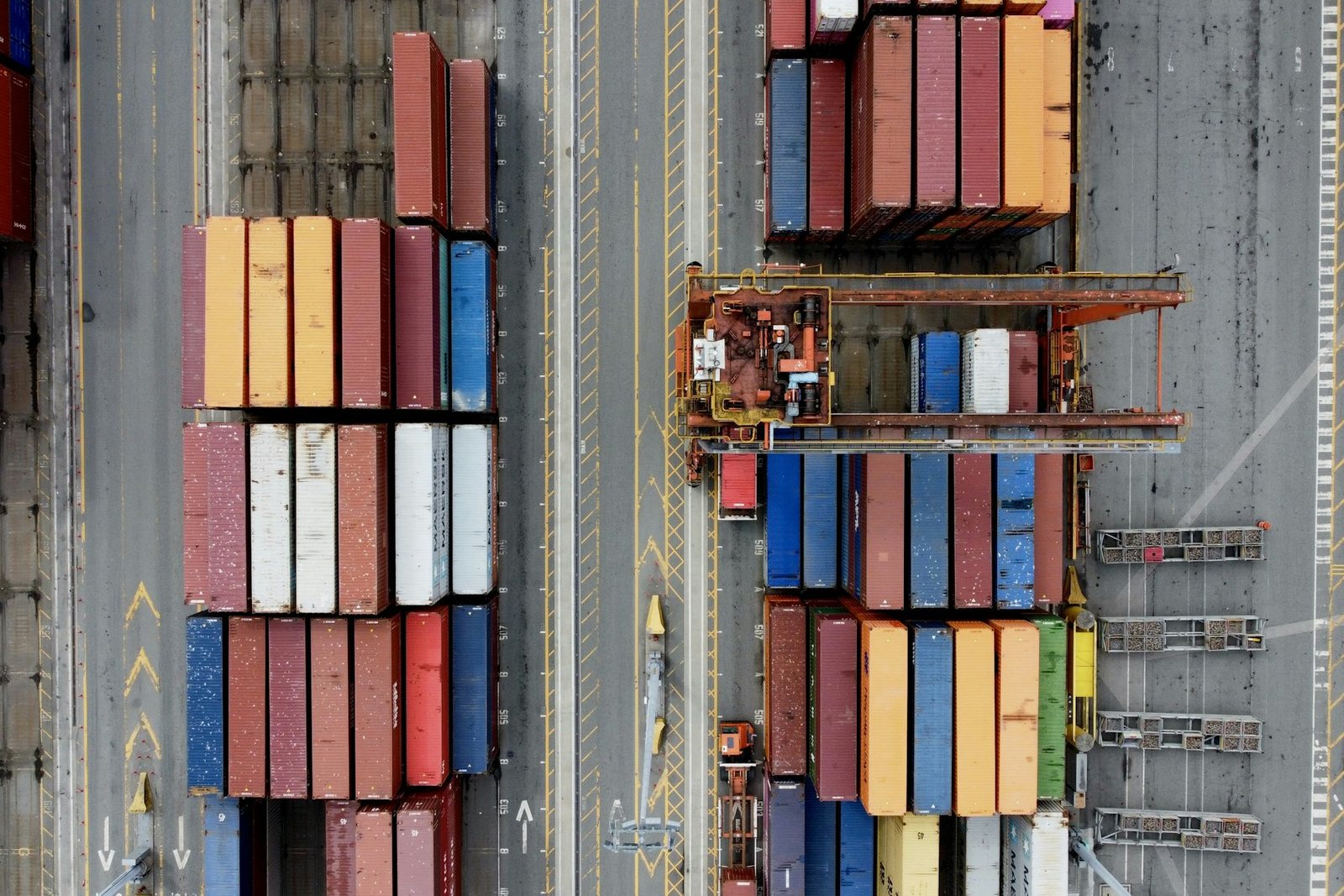 Aerial view of containers and handling equipment in a port